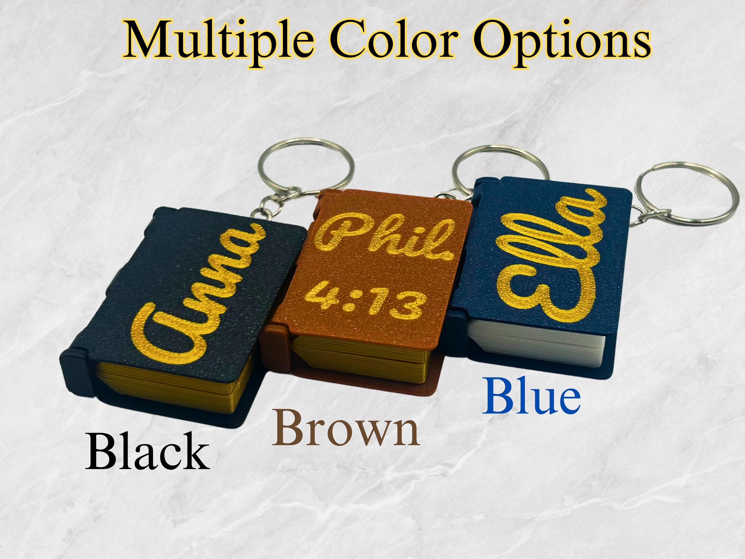 Scripture keychains in black, brown and blue with gold names