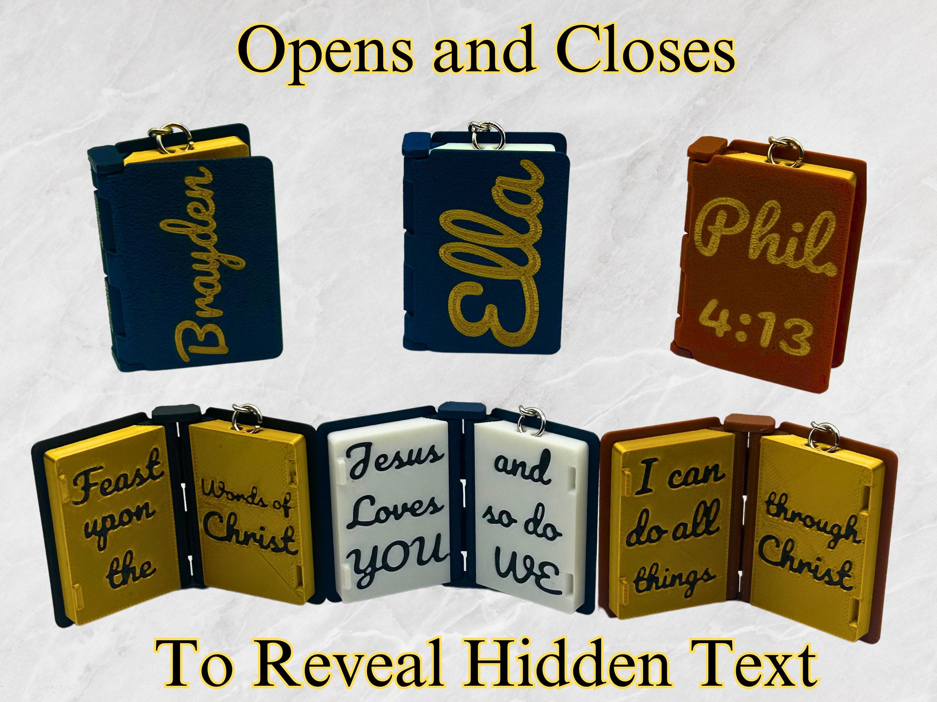Open scripture keychains showing verses printed inside