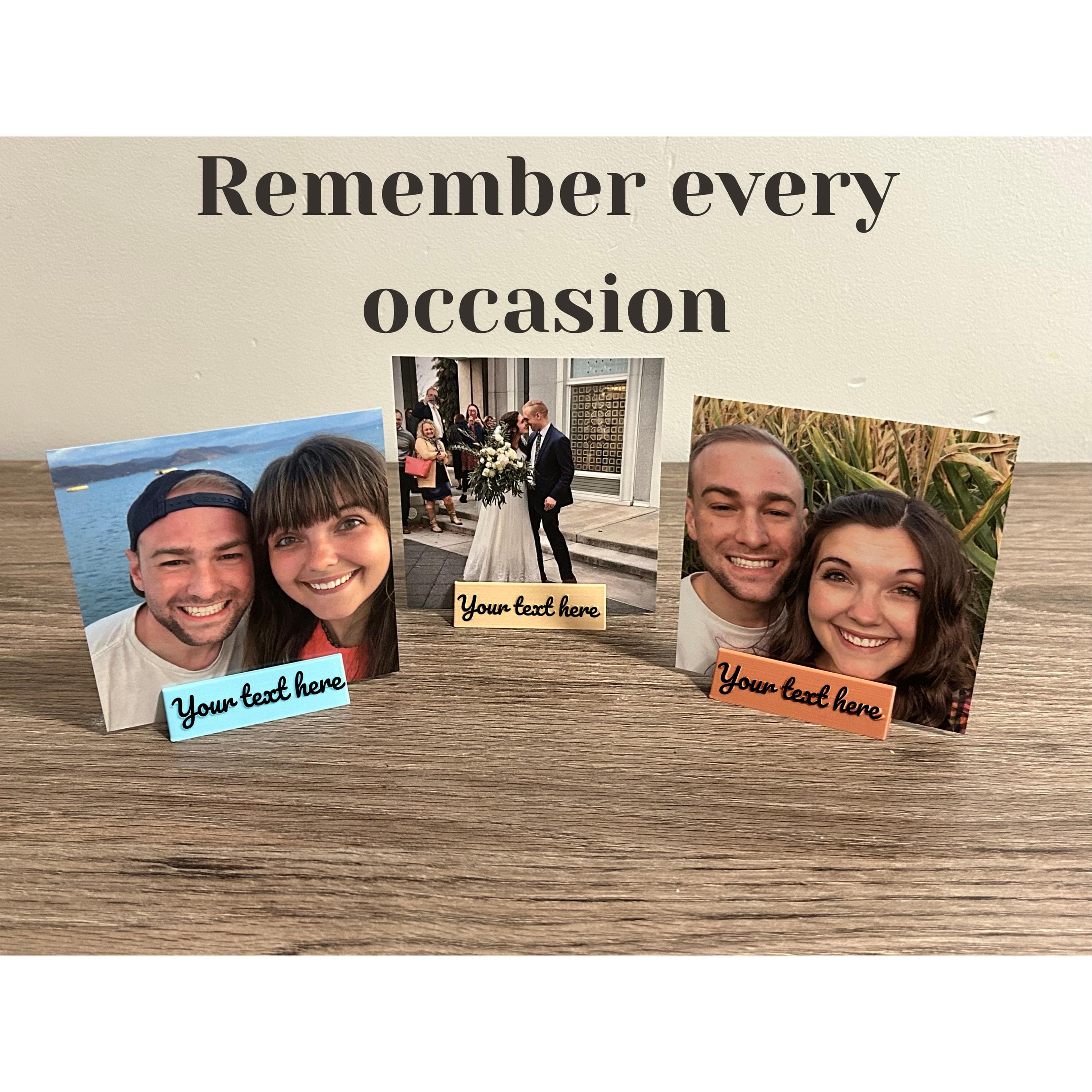 Three photo stands with personalized text bases