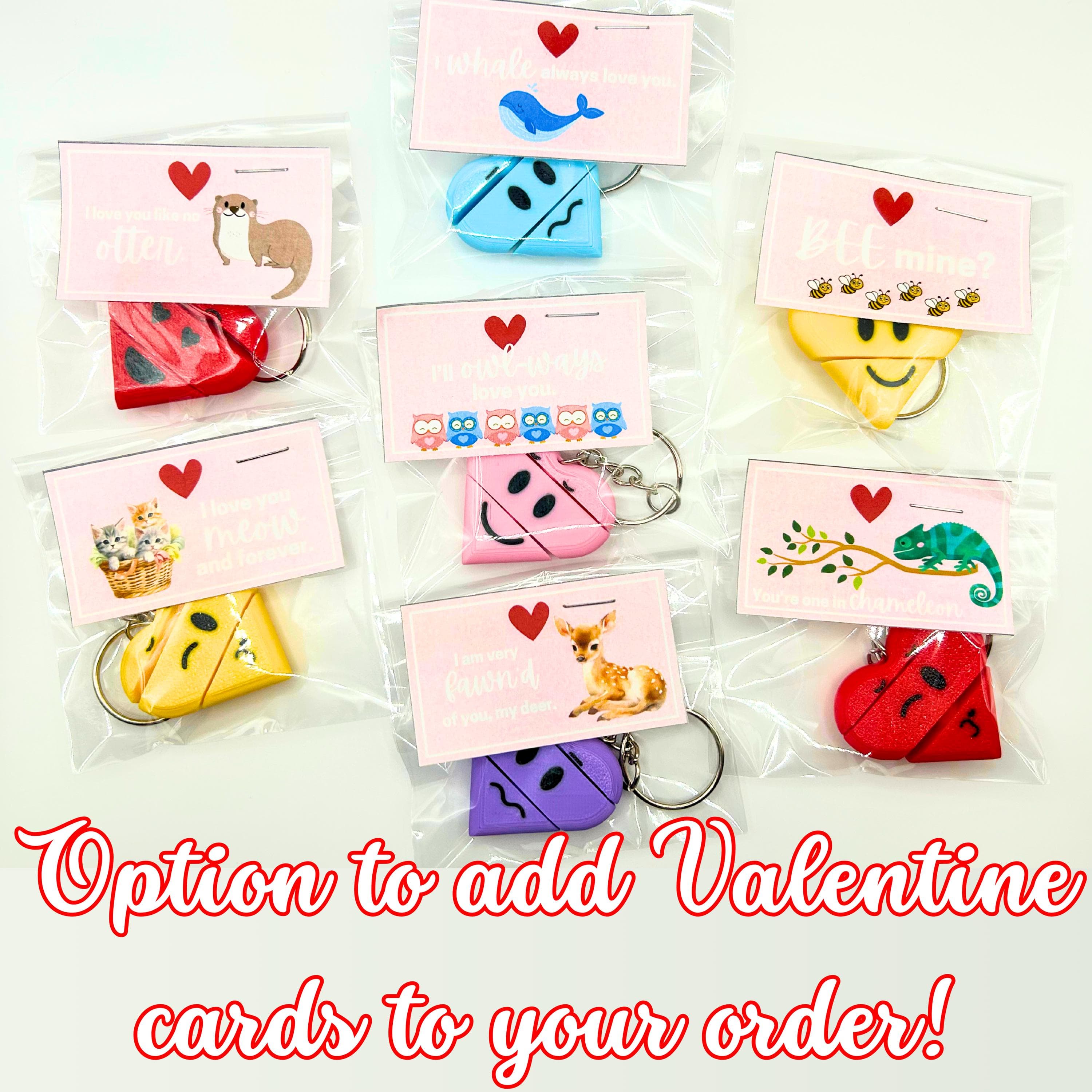 Heart fidget keychains attached to Valentine's cards
